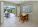 Eat-in kitchen with a view of the lanai and golf course at 232 Cerromar Way # 38, Venice, FL 34293