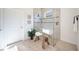 Modern bathroom showcasing a glass-enclosed shower, decorative artwork, and wood-look tile flooring at 23493 Copperleaf Dr, Venice, FL 34293