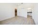 This bedroom offers access to an ensuite bathroom and a spacious closet for ample storage at 23493 Copperleaf Dr, Venice, FL 34293