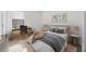 This bedroom features a dedicated work area with a desk, chair and a large window for natural light at 23493 Copperleaf Dr, Venice, FL 34293