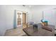 Bright home office with french doors and a large desk, creating an ideal work-from-home environment at 23493 Copperleaf Dr, Venice, FL 34293