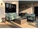 Charming patio showcases comfortable seating and a modern fire pit at 23493 Copperleaf Dr, Venice, FL 34293