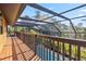 Screened in balcony view of a pool with mature landscaping at 236 Cory St, Port Charlotte, FL 33953