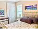Cozy bedroom featuring a comfortable bed with soft linens, bedside table, and closet space at 236 Soliera St, Nokomis, FL 34275