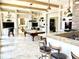 This game room features a pool table, bar seating, and built-in shelving for entertainment and relaxation at 236 Soliera St, Nokomis, FL 34275