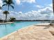 Resort-style community pool with stunning lake views, offering a relaxing oasis for residents and guests at 236 Soliera St, Nokomis, FL 34275