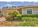 Charming single-story home with a two car garage and lush landscaping at 24849 Pennington Ter, Venice, FL 34293