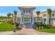 The Waterline entry boasts vibrant landscaping and a welcoming facade, setting the tone for this exceptional community at 25069 Pearl Lake Cir, Englewood, FL 34223