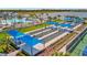 An aerial view of the community's bocce ball and pool area, showcasing the variety of recreational activities available at 25069 Pearl Lake Cir, Englewood, FL 34223