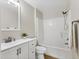 Clean bathroom featuring a tub-shower combo, modern vanity, and neutral tones for a calming experience at 2614 River Preserve Ct # 2614, Bradenton, FL 34208