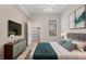 Comfortable bedroom featuring a cozy bed, natural light, and modern decor for relaxation and restful nights at 2614 River Preserve Ct # 2614, Bradenton, FL 34208