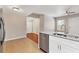 Bright kitchen featuring granite countertops, stainless steel appliances, and tiled flooring at 2614 River Preserve Ct # 2614, Bradenton, FL 34208