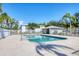 The clear community pool with safety fence is a refreshing oasis in the neighborhood at 2614 River Preserve Ct # 2614, Bradenton, FL 34208