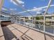 Beautiful in-ground hot tub surrounded by brick pavers, a boat dock and access to the canal at 314 Oakwood Cir, Englewood, FL 34223