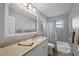 Bathroom with a shower/tub, toilet, and a vanity with light countertop and mirror at 316 Signorelli Dr, Nokomis, FL 34275