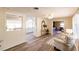 Open concept living area showcasing modern flooring and seamless flow into adjacent rooms at 3716 Mundy Ridge Dr, Sarasota, FL 34233
