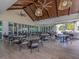 Spacious restaurant with modern lighting, ample seating, and scenic views at 396 Lansbrook Dr, Venice, FL 34292