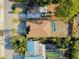 Aerial view showcases the home's layout, with a pool and patio area, landscaped yard, and neighborhood setting at 429 Riviera St, Venice, FL 34285
