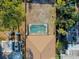 Aerial view of backyard, pool, and roof for a single Gathering house at 429 Riviera St, Venice, FL 34285
