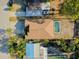 An aerial view highlights the home's placement, pool, and proximity to neighboring properties at 429 Riviera St, Venice, FL 34285