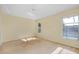 This bedroom features carpeted floors and windows for natural light at 429 Riviera St, Venice, FL 34285
