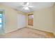 Neutral bedroom with carpet, ceiling fan, and window with blinds at 429 Riviera St, Venice, FL 34285