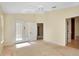 This bedroom offers carpeted floors, neutral walls and access to an ensuite bathroom at 429 Riviera St, Venice, FL 34285