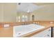 Double kitchen sink with white cabinets at 429 Riviera St, Venice, FL 34285
