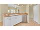 Open kitchen layout featuring a sink, cabinets, and eat-in bar at 429 Riviera St, Venice, FL 34285