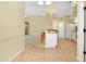 Bright kitchen featuring breakfast bar and view of living space at 429 Riviera St, Venice, FL 34285