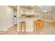 Kitchen area featuring a breakfast bar with counter seating at 429 Riviera St, Venice, FL 34285
