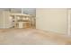 Open-concept living area with breakfast bar and view of the kitchen at 429 Riviera St, Venice, FL 34285