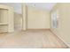 Spacious living room with neutral paint, carpet flooring, bright windows with shutters, and an airy ceiling fan at 429 Riviera St, Venice, FL 34285