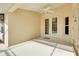 Covered patio area featuring a ceiling fan, perfect for enjoying the outdoors comfortably at 429 Riviera St, Venice, FL 34285