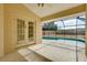Inviting screened-in pool area with clear blue water and plenty of space for outdoor entertaining at 429 Riviera St, Venice, FL 34285