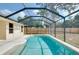 Relaxing screened-in pool area with comfortable outdoor seating, perfect for enjoying warm days at 429 Riviera St, Venice, FL 34285