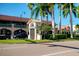 This scenic view captures historic downtown Venice, FL, with its unique archway, palms, and quaint buildings at 429 Riviera St, Venice, FL 34285