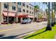 Street view of a mixed-use commercial building with awnings and convenient parking at 429 Riviera St, Venice, FL 34285