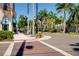 A charming street view showing downtown Venice, FL, with palm trees, businesses, and a seahorse statue at 429 Riviera St, Venice, FL 34285