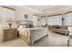 Comfortable bedroom with a king bed and ample natural light at 4403 Via Del Villetti Dr, Venice, FL 34293