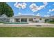 The home has a pool and patio perfect for outdoor living and entertaining at 447 Rotonda Cir, Rotonda West, FL 33947