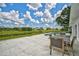 Backyard features a pool, patio, and a canal view, perfect for outdoor relaxation at 447 Rotonda Cir, Rotonda West, FL 33947