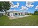 This property includes a private pool, patio, and well-maintained lawn for enjoying the outdoors at 447 Rotonda Cir, Rotonda West, FL 33947