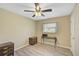 Small bedroom with wood floors, one window, and minimal furnishings at 447 Rotonda Cir, Rotonda West, FL 33947