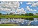 Scenic water view with lush landscaping enhancing the property's appeal at 447 Rotonda Cir, Rotonda West, FL 33947