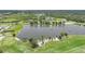 Aerial view of the community's lake and golf course at 4532 Chase Oaks Dr, Sarasota, FL 34241
