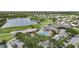 Aerial view of the beautiful clubhouse, pool, and golf course in this community at 4532 Chase Oaks Dr, Sarasota, FL 34241