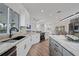 Spacious kitchen featuring granite countertops, modern appliances, and an open floor plan at 4532 Chase Oaks Dr, Sarasota, FL 34241