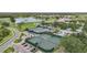 Aerial view of the community tennis courts and parking at 4532 Chase Oaks Dr, Sarasota, FL 34241