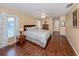 Spacious bedroom with wood floors and a ceiling fan at 455 Rubens E Dr, Nokomis, FL 34275